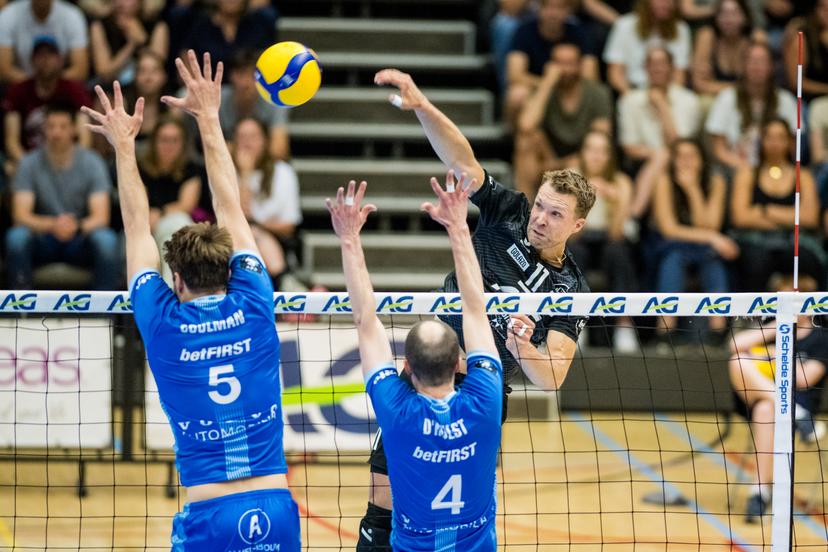 Roeselare's Pieter Coolman, Roeselare's Stijn D'Hulst and Leuven's Simon Peeters pictured in action during the match between Haasrode Leuven and Roeselare, a Play-off Final (4th game, best-of-5) game in the Lotto Volley League Men, Tuesday 13 May 2025 in Leuven. BELGA PHOTO JASPER JACOBS