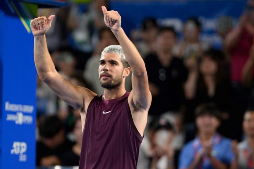 Spain's Carlos Alcaraz reacts after his men's singles match against USA's Brandon Nakashima at the ATP Japan Open tennis tournament in Tokyo on September 28, 2025.  Philip FONG / AFP