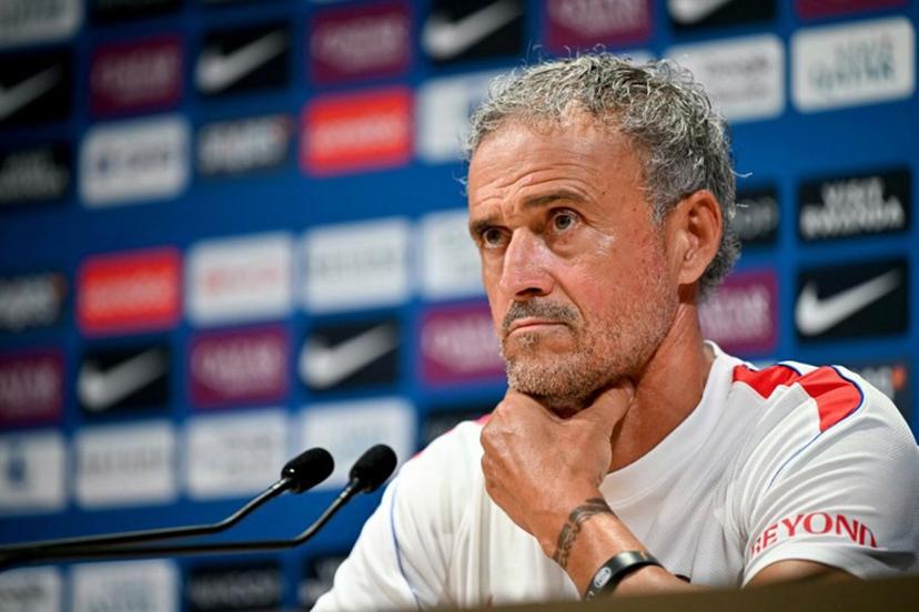PSG's Spanish headcoach Luis Enrique looks on as he delivers a press conference following a training session at the Paris Saint-Germain's campus in Poissy, west of Paris on August 15, 2026, on the eve of their French Super Cup (Trophee des Champions) football match against RC Lens.  LOU BENOIST / AFP