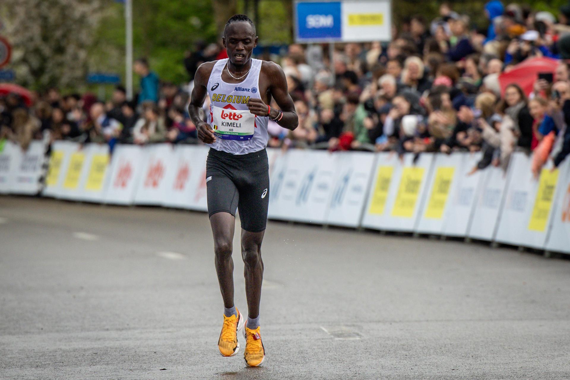 Belgian Isaac Kimeli crosses the finish line with the third time at the men 10km race at European Running Championships, in Leuven, Sunday 13 April 2025. BELGA PHOTO DAVID PINTENS