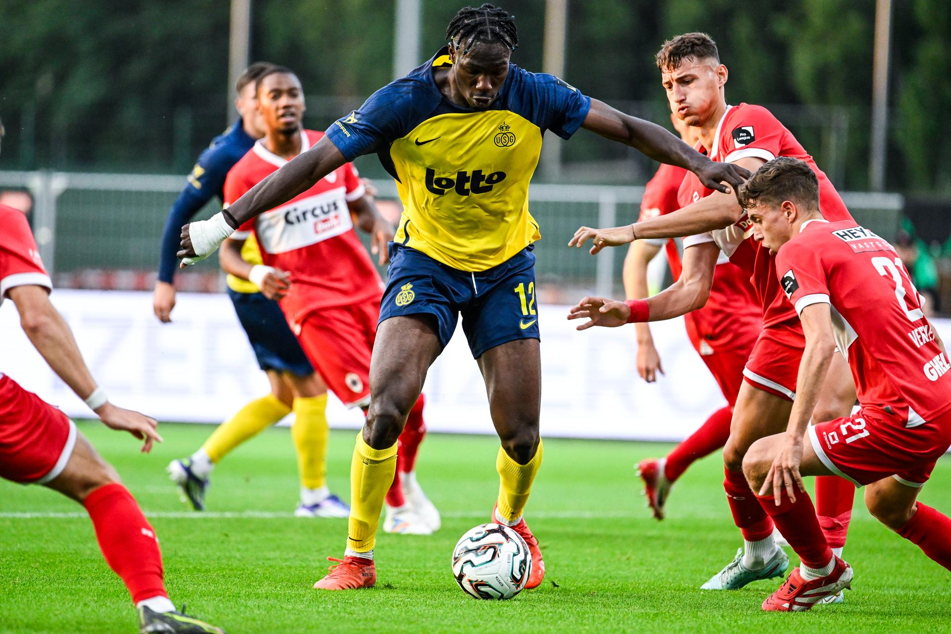 Union's Promise David, Antwerp's Rosen Bozhinov and Antwerp's Andreas Verstraeten pictured in action during a soccer match between Royal Antwerp FC and Royale Union Saint-Gilloise, Friday 25 July 2025 in Brussels, on day 1 of the 2025-2026 'Jupiler Pro League' first division of the Belgian championship. BELGA PHOTO TOM GOYVAERTS