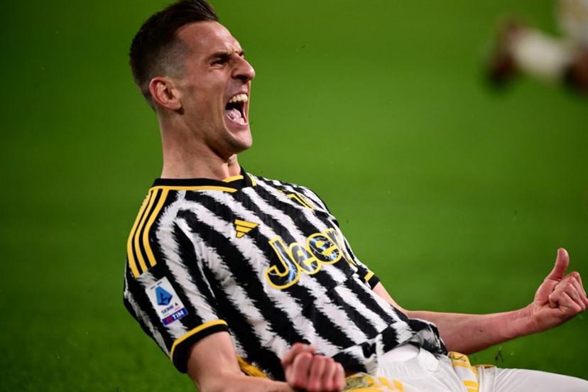 Juventus' Polish forward #14 Arkadiusz Milik reacts after scoring his team's second goal during the Italian Serie A football match between Juventus and Atalanta at the Allianz Stadium in Turin, on March 10, 2024.  MARCO BERTORELLO / AFP