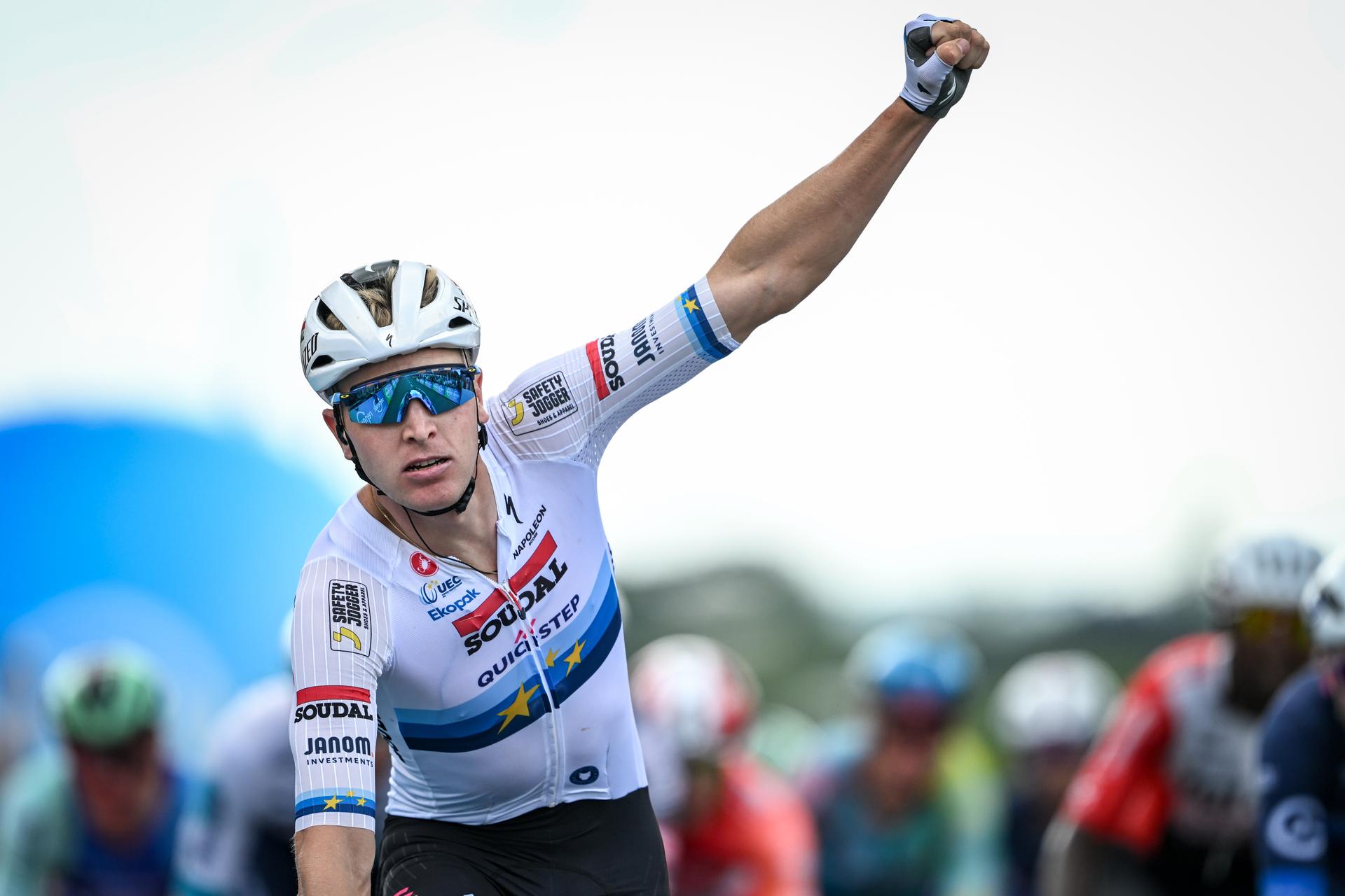 Belgian Tim Merlier of Soudal Quick-Step celebrates as he crosses the finish line to win the fourth stage of the 'Renewi Tour' multi-stage cycling race, from Riemst to Bilzen-Hoeselt (196 km) on Saturday 23 August 2025. The five-day race takes place in Belgium and the Netherlands. BELGA PHOTO DAVID PINTENS