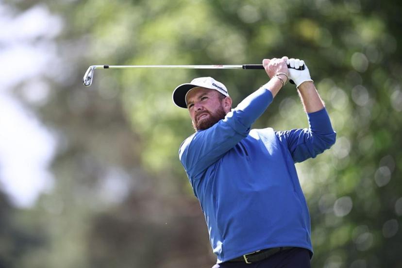 Ireland's Shane Lowry tees off on the 14th on the second day of the BMW PGA Championship at Wentworth Golf Club, south-west of London, on September 12, 2025.  HENRY NICHOLLS / AFP