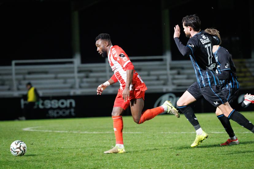Kortrijk's Thierry Ambrose and Club's Thibaut Van Acker fight for the ball during a soccer game between Club NXT and KV Kortrijk, Tuesday 27 January 2026 in Roeselare, on day 22 of the 2025-2026 'Challenger Pro League' 1B second division of the Belgian championship. BELGA PHOTO KURT DESPLENTER