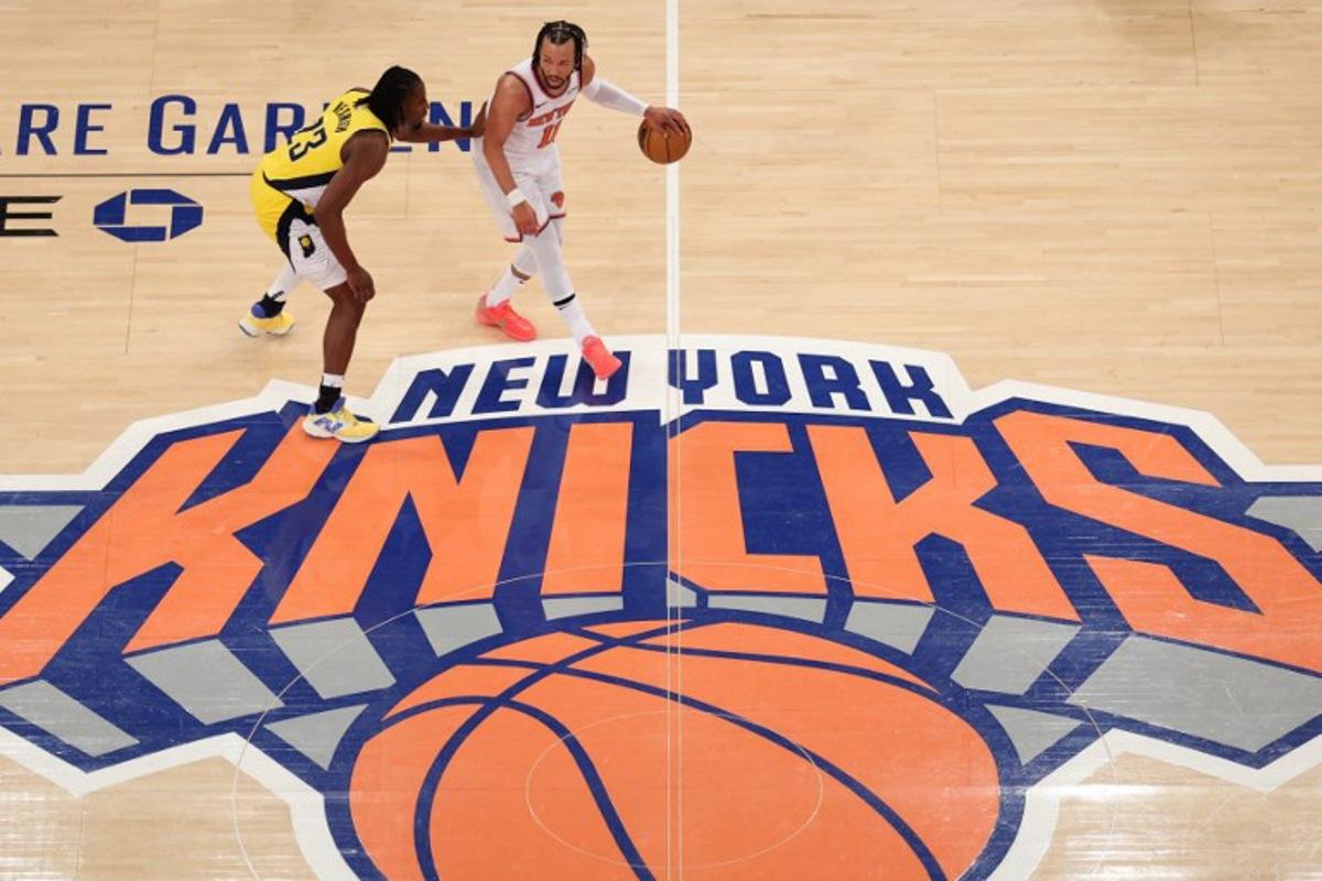 The Knicks' point guard #11 Jalen Brunson dribbles the ball under pressure from the Pacers' small forward #23 Aaron Nesmith during Game Five of the Eastern Conference Finals of the 2025 NBA Playoffs between the New York Knicks and the Indiana Pacers at Madison Square Garden in New York on May 29, 2025.  CHARLY TRIBALLEAU / AFP