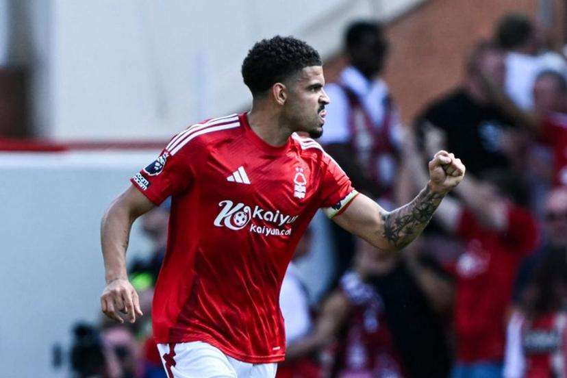 Nottingham Forest's English midfielder #10 Morgan Gibbs-White celebrates after scoring his team first goal during the English Premier League football match between Nottingham Forest and Leicester City at The City Ground in Nottingham, central England, on May 11, 2025.  JUSTIN TALLIS / AFP