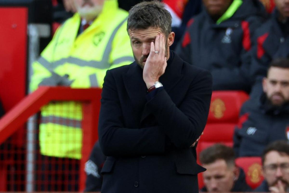 Manchester United's English head coach Michael Carrick gestures on the touchline during the English Premier League football match between Manchester United and Bournemouth at Old Trafford in Manchester, north west England, on October 25, 2026.  Darren Staples / AFP