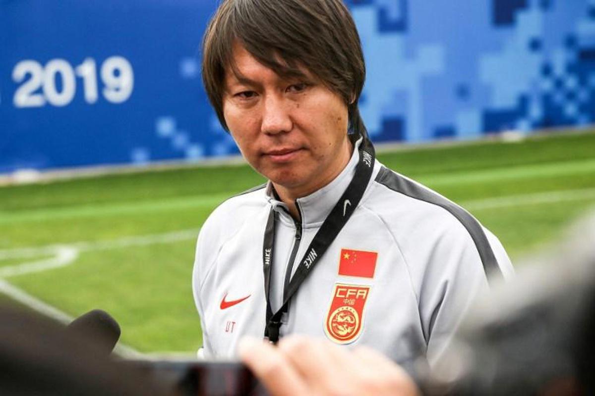 This photo taken on November 6, 2019 shows Li Tie, then head coach of the Chinese national men's football selection team, taking part in a training session in Wuhan in China's central Hubei province. Former Everton midfielder Li Tie was named as coach of China's men's football team on January 2, 2020, tasked with reviving their troubled World Cup qualifying campaign after the abrupt departure of Marcello Lippi. STR / AFP China OUT

