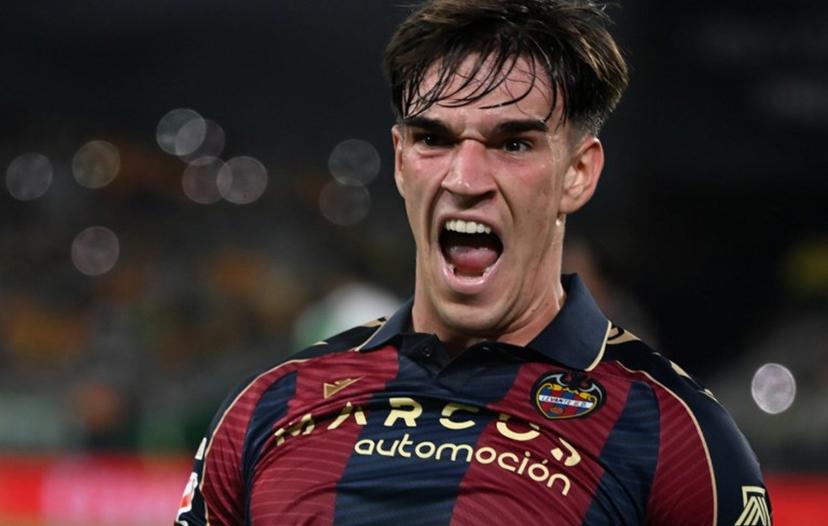 Levante's Spanish forward #19 Carlos Espi Escrihuela celebrates scoring his team's first goal during the Spanish league football match between Real Betis and Levante UD at Benito Villamarin Stadium in Seville on May 23, 2026.  CRISTINA QUICLER / AFP