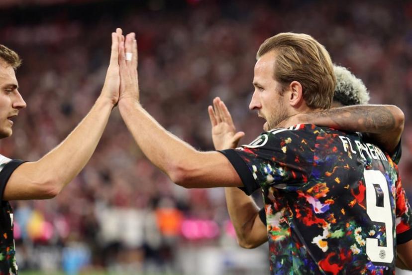 Bayern Munich's English forward #09 Harry Kane celebrates scoring his team's second goal with teammates during the German first division Bundesliga football match between FC Bayern Munich and Union Berlin in Munich, southern Germany on September 18, 2026.  Alexandra BEIER / AFP