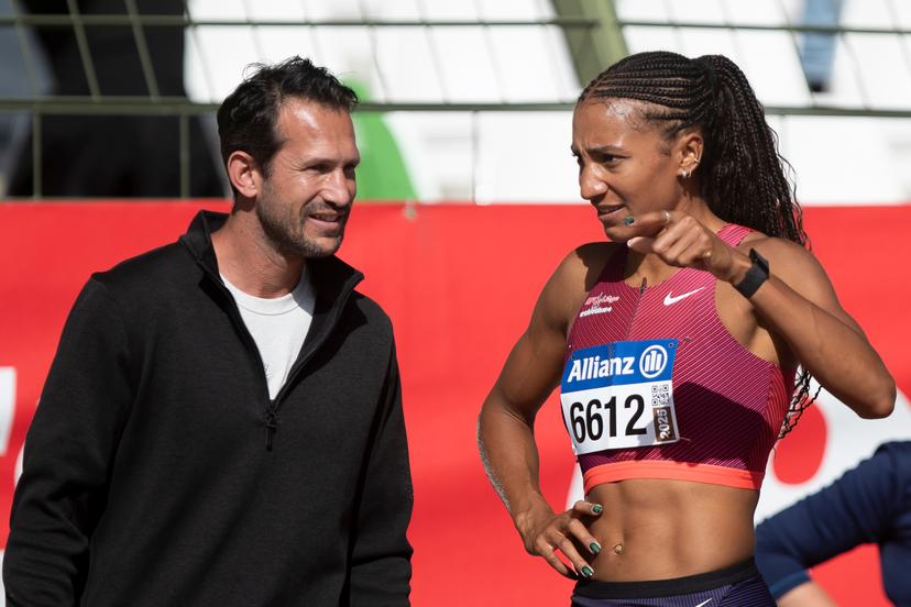 Coach Michael Van der Plaetsen and Nafissatou Nafi Thiam pictured during the Belgian athletics championships, Saturday 02 August 2025 in Brussels. The Belgian championships take place from 2-3 August, 2025. BELGA PHOTO KRISTOF VAN ACCOM
