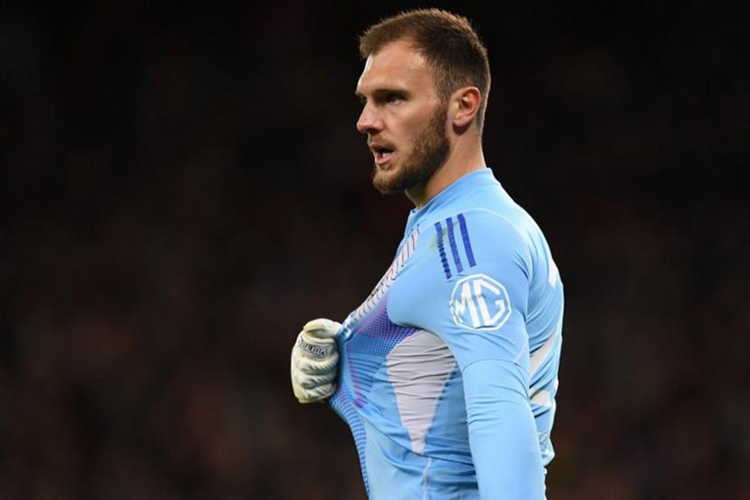 Lyon's Brazilian goalkeeper #23 Lucas Perri complains to the officials after conceding their second goal during the UEFA Europa league quarter-final final, second leg football match between Manchester United and Lyon at Old Trafford stadium in Manchester, north west England, on April 17, 2025.  Oli SCARFF / AFP