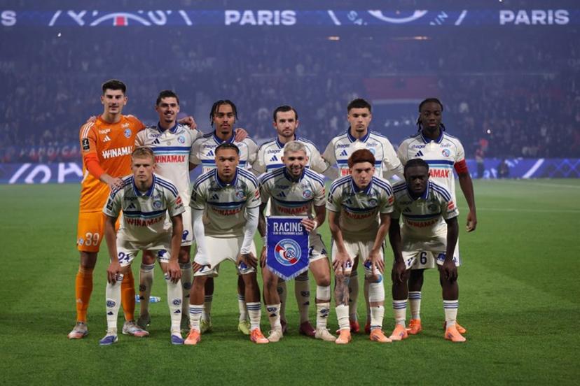 Strasbourg's players pose for a team photograph ahead of the French L1 football match between Paris Saint-Germain (PSG) and RC Strasbourg Alsace at the Parc des Princes Stadium in Paris on October 17, 2025.  Franck FIFE / AFP