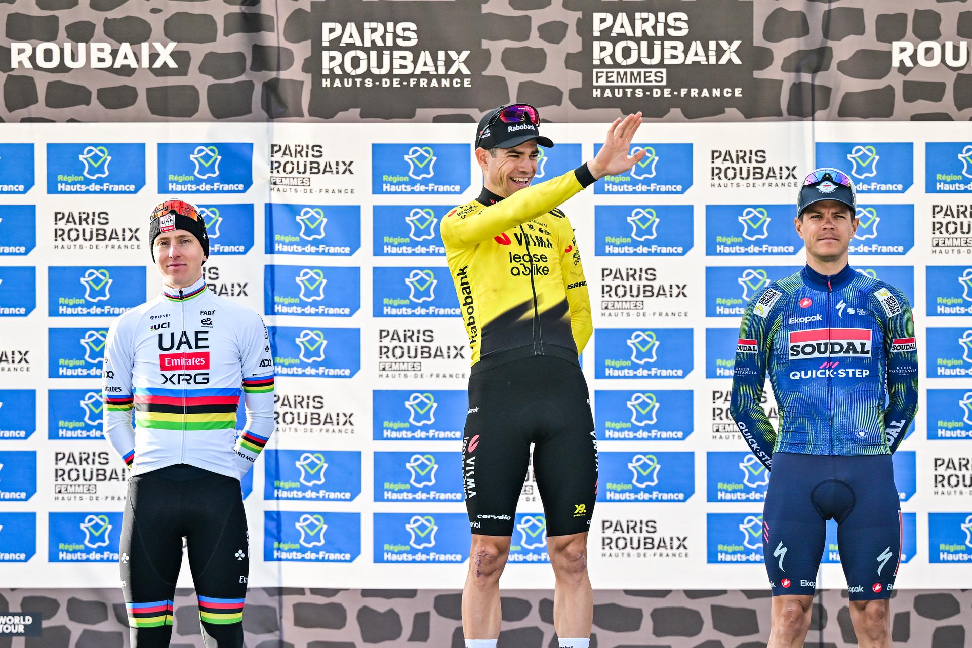 Slovenian Tadej Pogacar of UAE Team Emirates-XRG, Belgian Wout van Aert of Team Visma-Lease a Bike and Belgian Jasper Stuyven of Soudal Quick-Step pictured on the podium after the men's Paris-Roubaix cycling race, Sunday 12 April 2026, around Roubaix, France. The 123rd edition of Paris-Roubaix cycling races will take on Sunday, with the women riding 143,1 km the men riding 258,3 km on Sunday. BELGA PHOTO DIRK WAEM