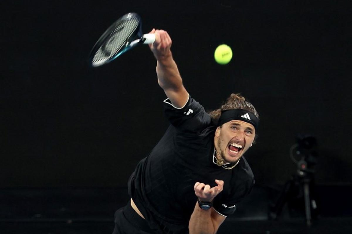 Germany's Alexander Zverev serves to Britain's Cameron Norrie during their men's singles match on day six of the Australian Open tennis tournament in Melbourne on January 23, 2026.  Martin KEEP / AFP