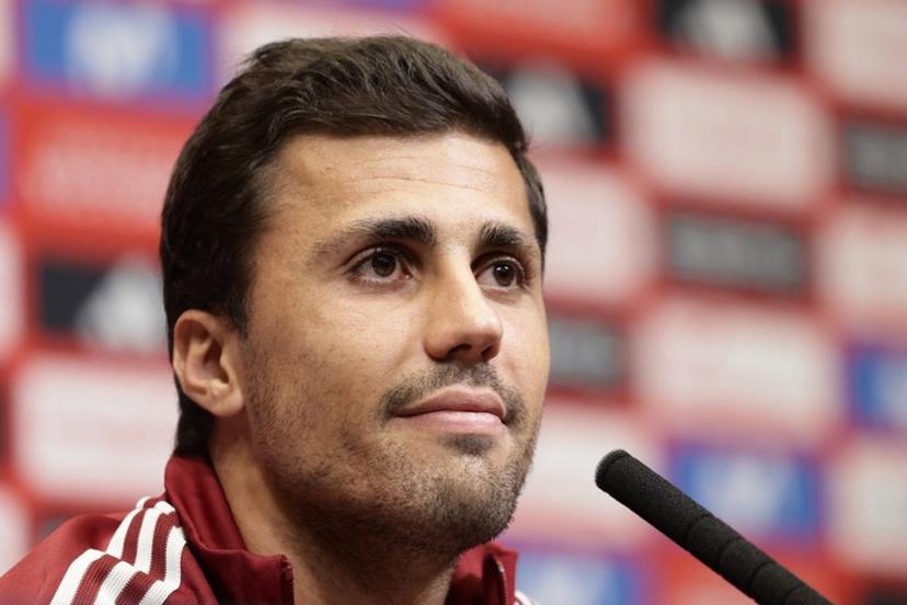 Spain's midfielder #16 Rodri smiles during a press conference at Wembley Stadium, north west London, on September 25, 2026, ahead of their Nations League fixture against England.  Brook Mitchell / AFP