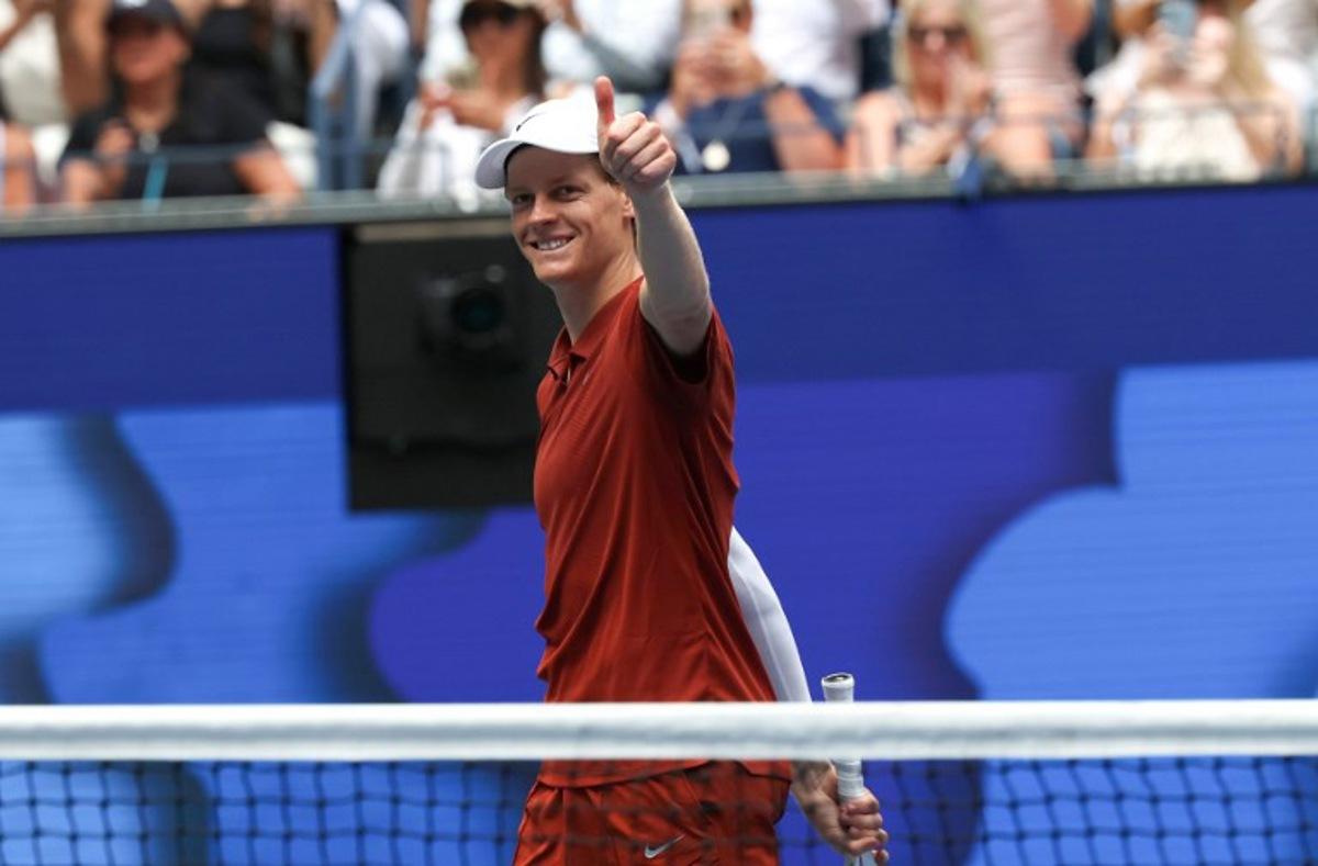 Jannik Sinner of Italy celebrates defeating Vit Kopriva of the Czech Republic in their men's singles first round tennis match on day three of the US Open tennis tournament at the USTA Billie Jean King National Tennis Center in New York City on August 26, 2025.  TIMOTHY A. CLARY / AFP