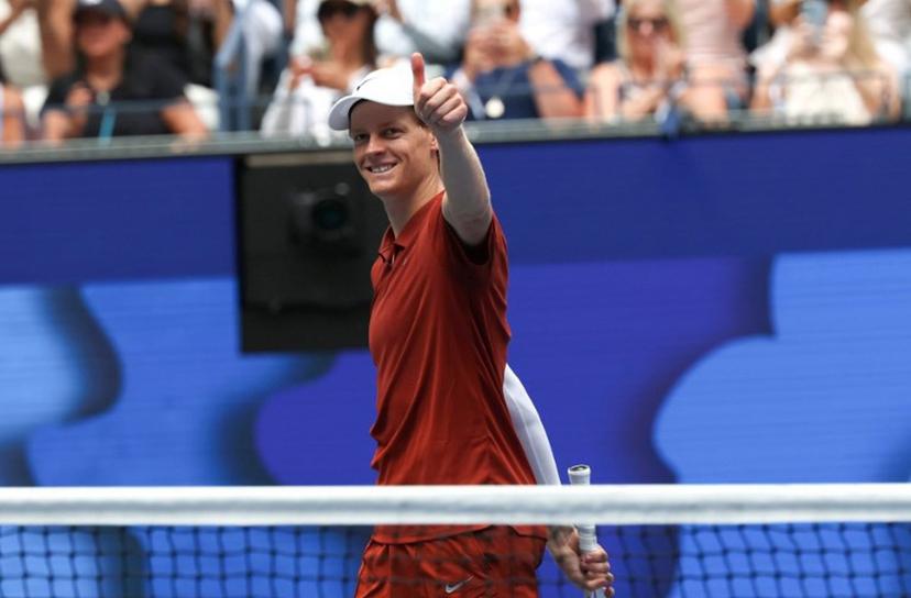 Jannik Sinner of Italy celebrates defeating Vit Kopriva of the Czech Republic in their men's singles first round tennis match on day three of the US Open tennis tournament at the USTA Billie Jean King National Tennis Center in New York City on August 26, 2025.  TIMOTHY A. CLARY / AFP
