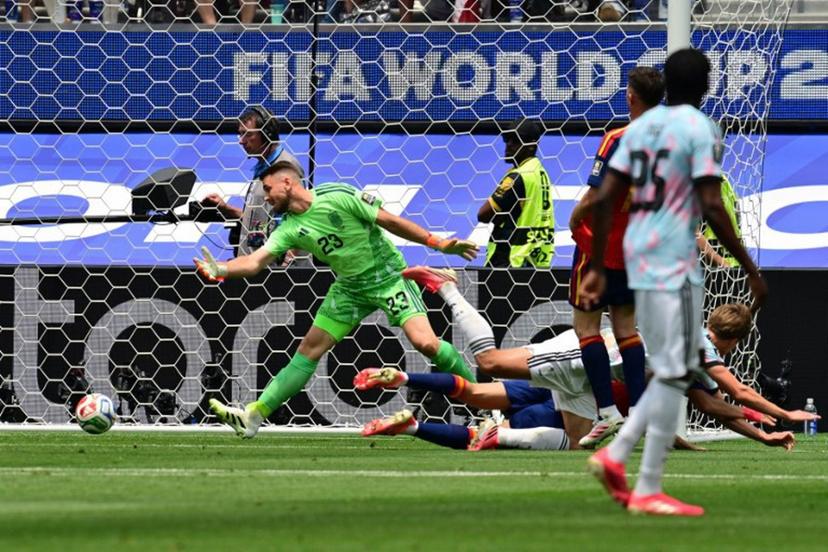 Belgium's forward #17 Charles De Ketelaere (R) scores his team's first goal during the 2026 World Cup football tournament quarter-final match between Spain and Belgium at the Los Angeles Stadium in Inglewood on July 10, 2026.   Frederic J. Brown / AFP