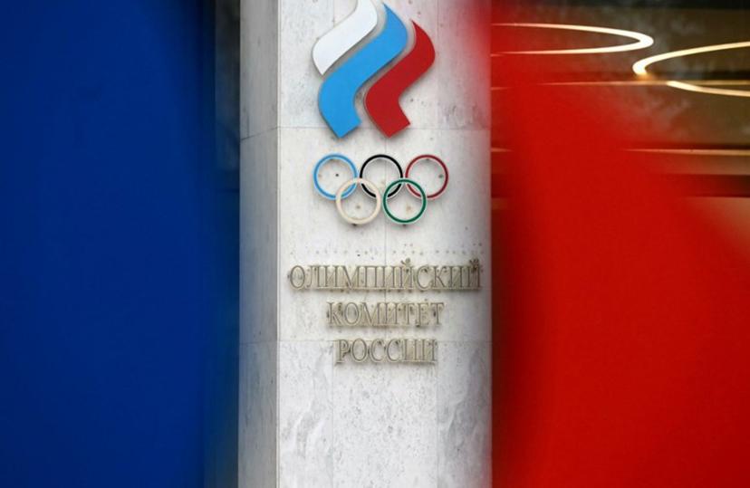 This photograph shows the logo of the Russian Olympic Committee (ROC) at the entrance of their office in Moscow on October 15, 2024. The head of Russia's Olympic Committee announced his resignation on October 15, 2024, a surprise move that comes as Moscow faces isolation from international sport over its Ukraine offensive. Former fencer, Stanislav Pozdnyakov, a five-time Olympic medallist, said in his resignation letter there were "timely" reasons why Russian sport needed a new leader, without going into detail. Natalia KOLESNIKOVA / AFP