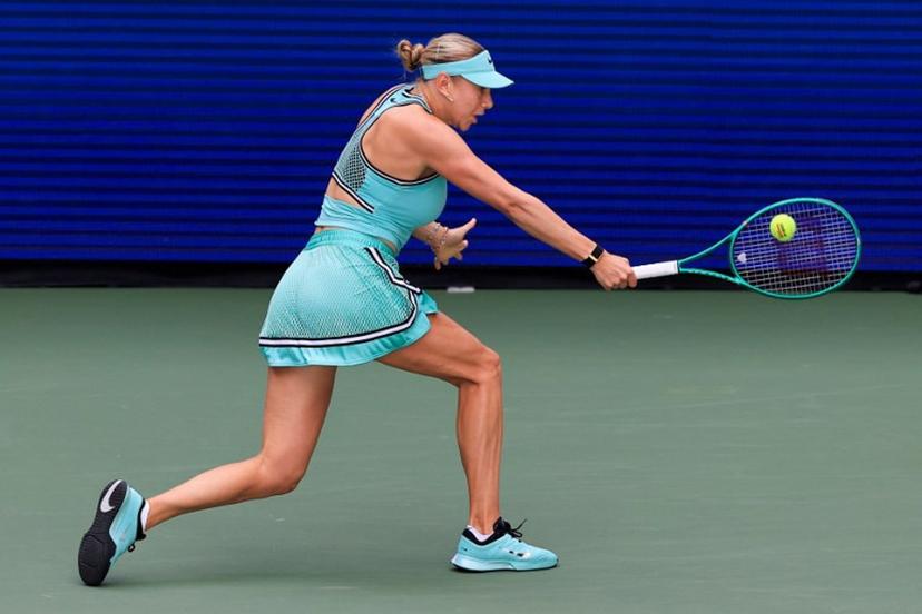 USA's Amanda Anisimova hits a return to Austria's Anastasia Potapova during their women's singles third round tennis match on day seven of the US Open tennis tournament at the USTA Billie Jean King National Tennis Center in New York City on September 5, 2026.  TIMOTHY A. CLARY / AFP
