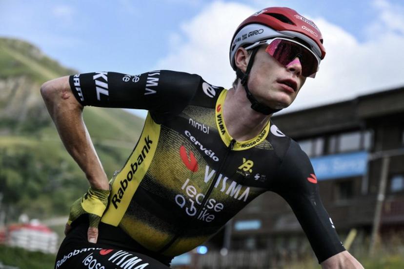 Team Visma - Lease a bike team's Danish rider Jonas Vingegaard looks on after the 10th stage of the 112th edition of the Tour de France cycling race, 165.3 km between Ennezat and Le Mont-Dore Puy de Sancy, in central France, on July 14, 2025.  Marco BERTORELLO / AFP
