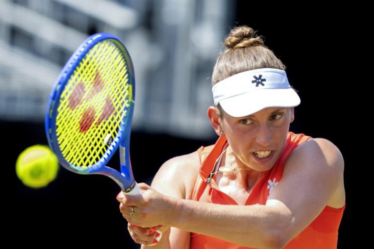 Belgium's Elise Mertens hits a return to China's Yue Yuan during their WTA Hertogenbosch open quarter final match against at the Autotron in Rosmalen, on June 13, 2025.  Sander Koning / ANP / AFP