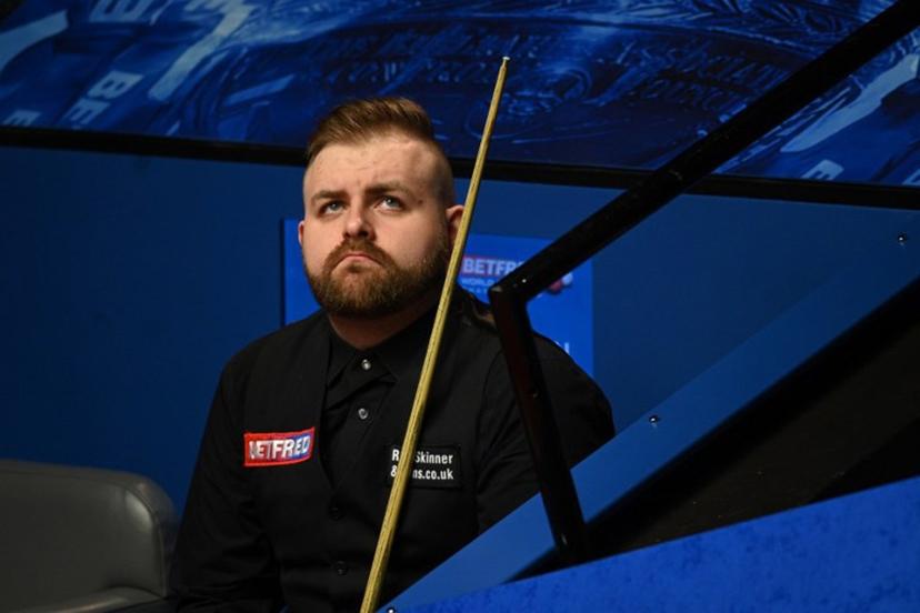 Jackson Page of Wales reacts during the World Snooker Championship Round Two match against Mark Williams of Wales at the Crucible Theatre, in Sheffield, northern England, on April 22, 2022.   OLI SCARFF / AFP