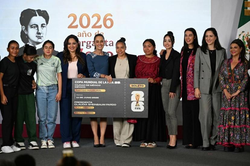 Mexico's President Claudia Sheinbaum (C) poses with the contest winners alongside Mexico City Mayor Clara Brugada (R) and other guests during the awards ceremony of the "Represent Mexico at the World Cup Opening" contest, launched in March, at the National Palace in Mexico City on May 29, 2026.  YURI CORTEZ / AFP