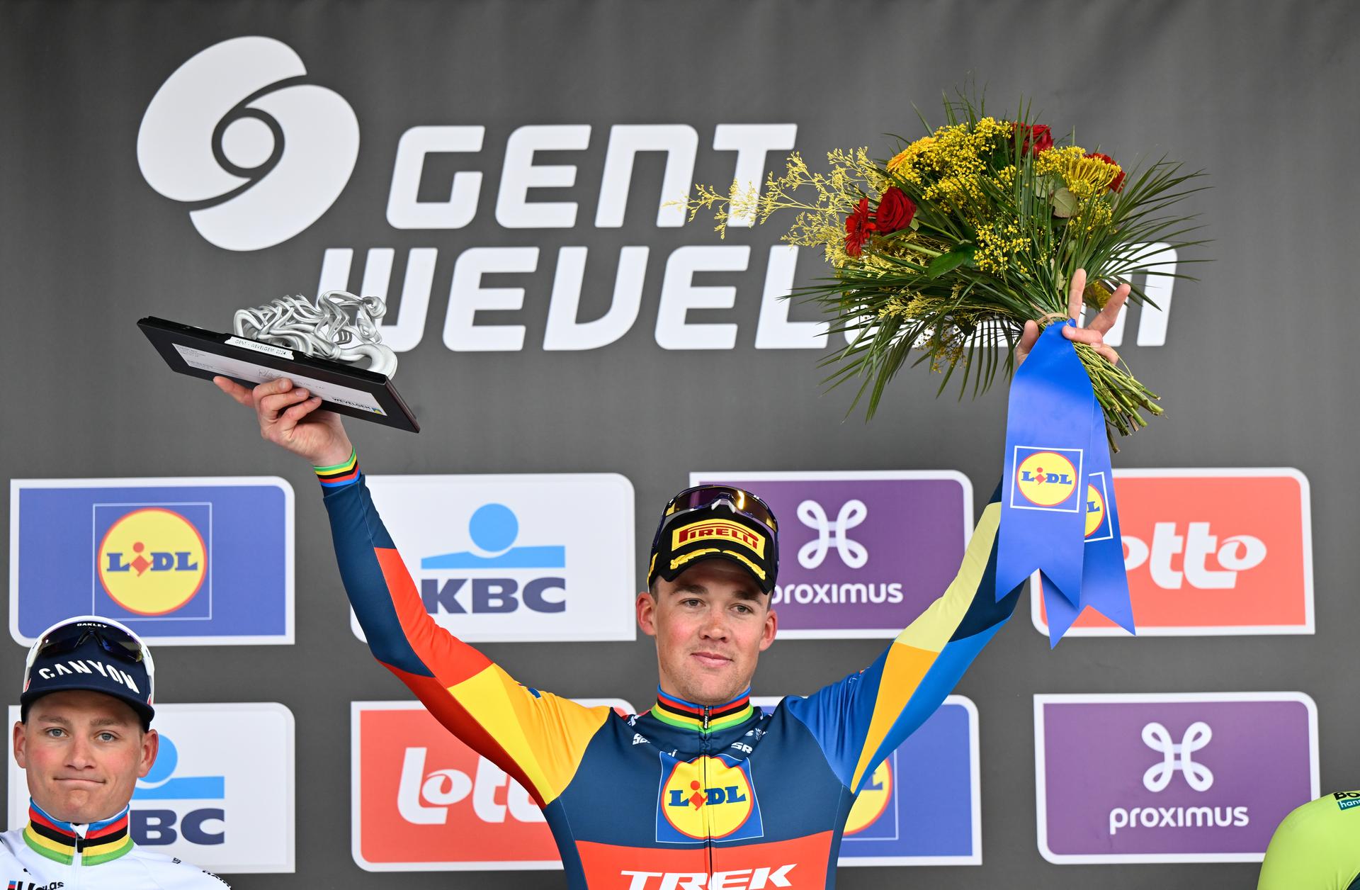 Danish Mads Pedersen of Lidl-Trek celebrates on the podium after winning the men's Gent-Wevelgem - In Flanders Fields cycling race, 253.1 km from Ieper to Wevelgem, Sunday 24 March 2024. BELGA PHOTO ERIC LALMAND