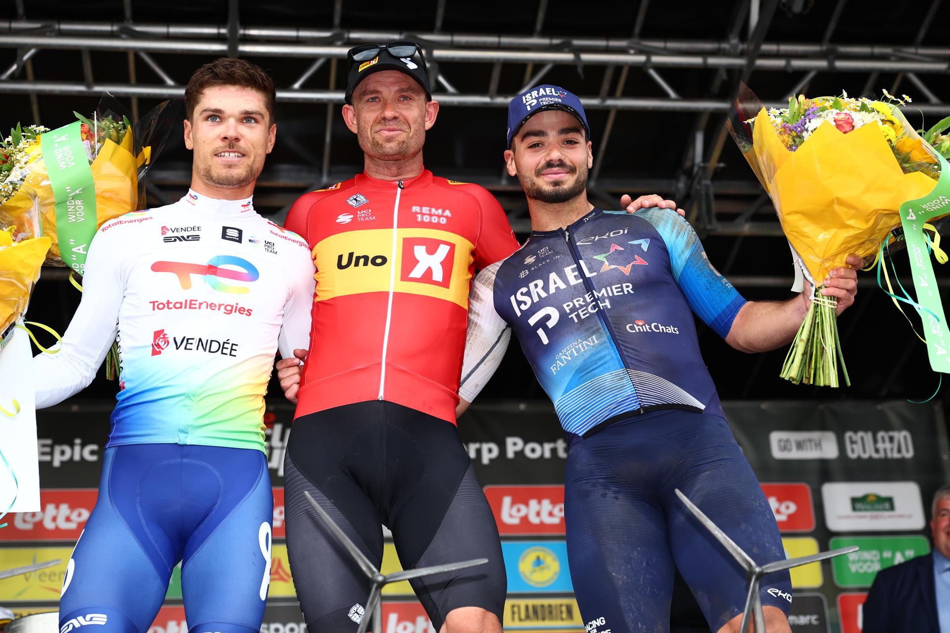 French Emilien Jeanniere of TotalEnergies, Norwegian Alexander Kristoff of Uno-X Mobility and Israeli Odet  Kogut of Israel-Premier Tech celebrate on the podium of the 'Antwerp Port Epic' 'Schaal Sels' men's elite one day cycling race, 177,9 km in and around Antwerp, fifth race (5/10) in the Lotto Cycling Cup, Sunday 19 May 2024.  BELGA PHOTO DAVID PINTENS
