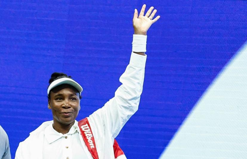 USA's Venus Williams waves at supporters after losing against Czech Republic's Karolina Muchova at the end of their women's singles first round tennis match on day two of the US Open tennis tournament at the USTA Billie Jean King National Tennis Center in New York City, on August 25, 2025.  Kena Betancur / AFP