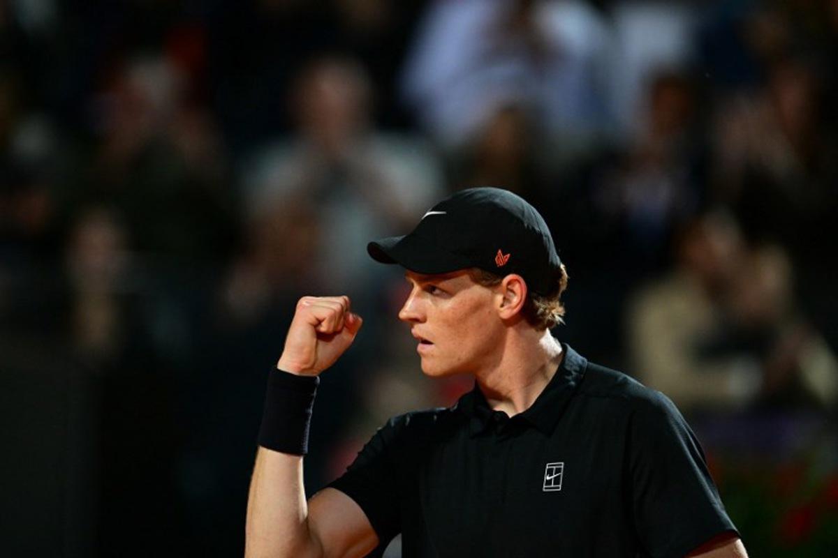 Italy's Jannik Sinner reacts during his men's singles semi-final match against USA's Tommy Paul for the ATP Rome Open tennis tournament at Foro Italico in Rome on May 16, 2025.   Tiziana FABI / AFP