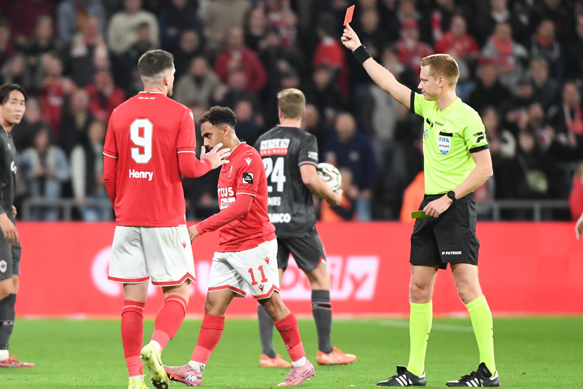 Standard's Adnane Abid receives a red card from the referee during a soccer match between Standard de Liege and Royal Antwerp FC, Friday 17 October 2025 in Liege, on day 11 of the 2025-2026 'Jupiler Pro League' first division of the Belgian championship. BELGA PHOTO JILL DELSAUX
