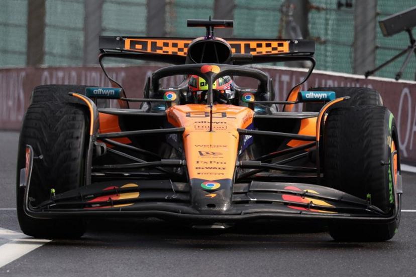 McLaren's Australian driver Oscar Piastri drives on the pit lane to make a pit stop during the Formula One Belgian Grand Prix at the Spa-Francorchamps circuit in Spa, on July 27, 2025.  YVES HERMAN / POOL / AFP