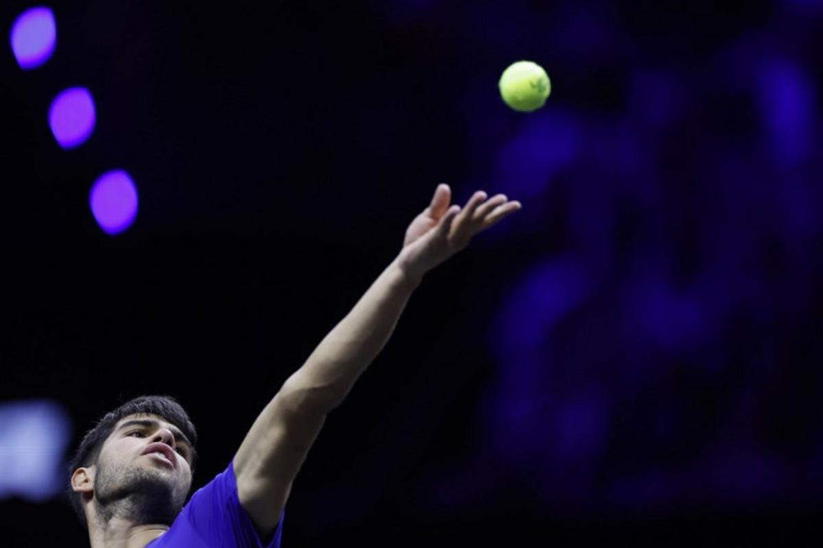 Spain's Carlos Alcaraz of Team Europe serves the ball to USA's Taylor Fritz of Team World during their 2024 Laver Cup men's singles tennis match in Berlin, Germany on September 22, 2024.  Odd ANDERSEN / AFP