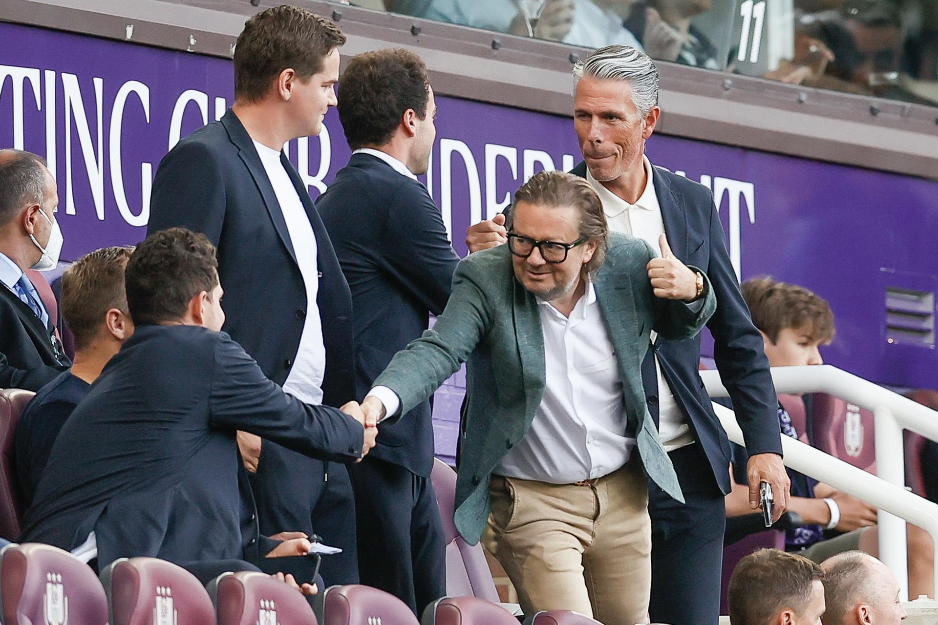 Anderlecht's main shareholder and former chairman Marc Coucke and Anderlecht's sports director Michael Verschueren pictured at the start of a soccer game between Belgian RSC Anderlecht and Danish Silkeborg IF, Thursday 08 September 2022, in Anderlecht, on the opening day of the group stage of the UEFA Conference League competition. BELGA PHOTO BRUNO FAHY
