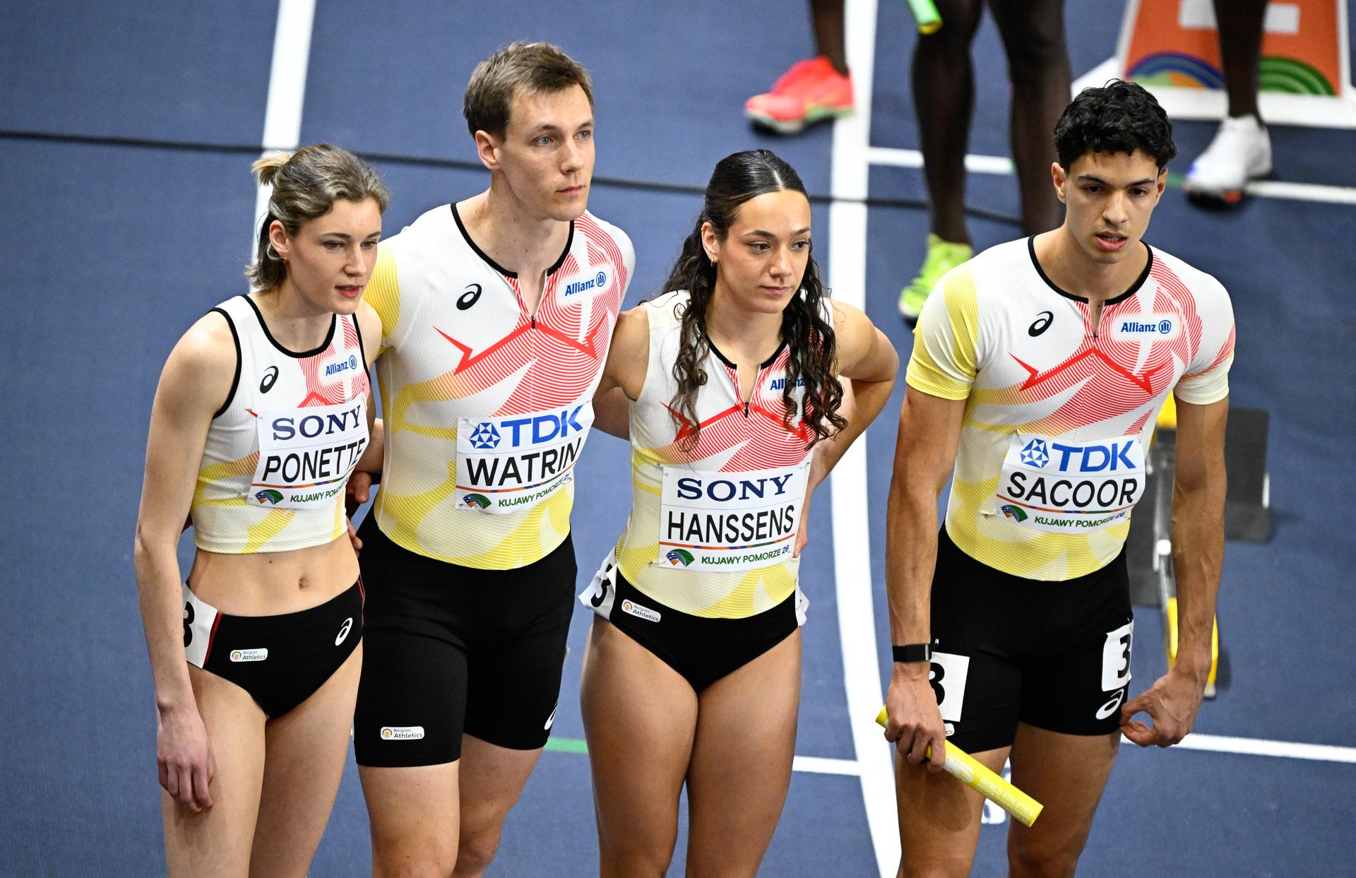 Belgian Helena Ponette, Belgian Julien Watrin, Belgian athlete Ilana Hanssens, Belgian Jonathan Sacoor,pictured before the 4x400m mixed relay, at and  the second day of the World Athletics Indoor Championship in Torun, Poland on Saturday 21 March 2026. The championships take place from 20 to 22 March. BELGA PHOTO JASPER JACOBS