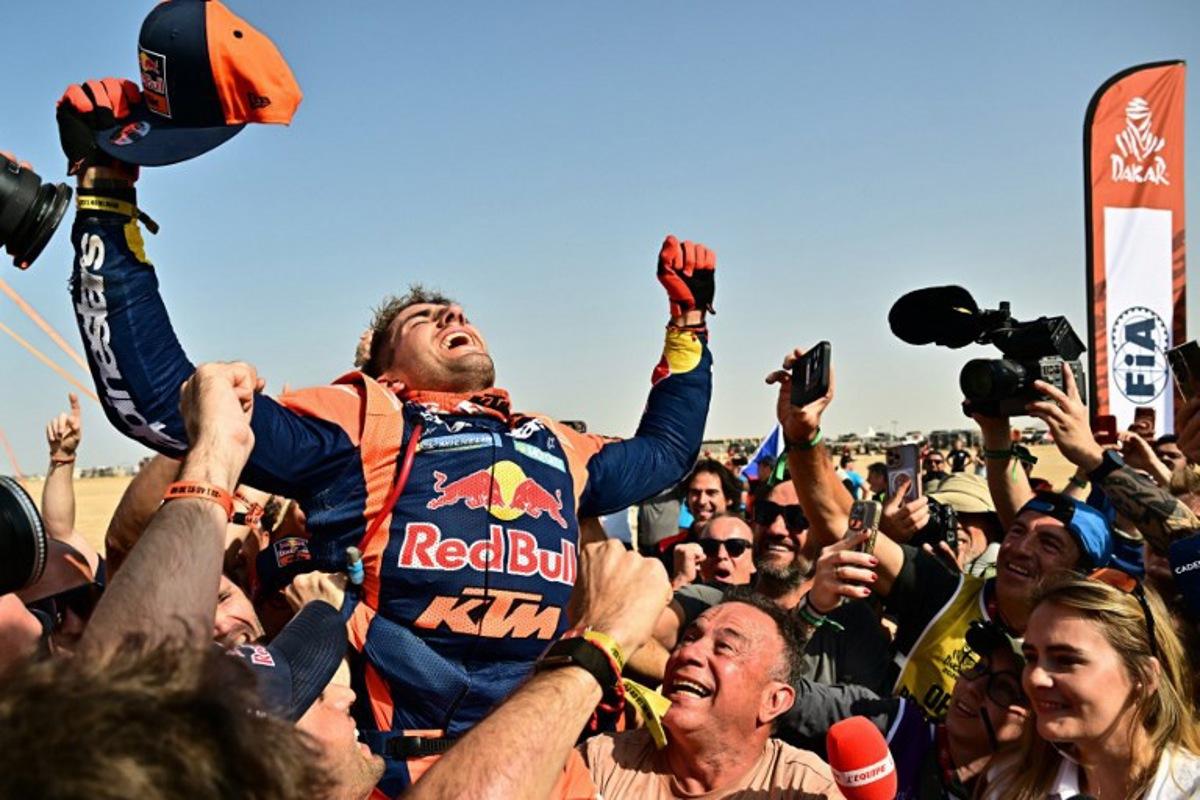 Argentine rider Luciano Benavides with a Ktm 450 Rally Factory celebrates after winning the 48th edition of the Dakar Rally 2026 in Yanbu, Saudi Arabia, on January 17, 2026.  Giuseppe CACACE / AFP