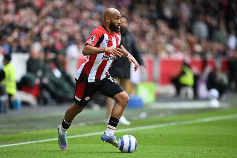 Brentford's French-born Cameroonian striker #19 Bryan Mbeumo runs with the ball during the English Premier League football match between Brentford and Manchester United at the Gtech Community Stadium in London on May 4, 2025.  JUSTIN TALLIS / AFP