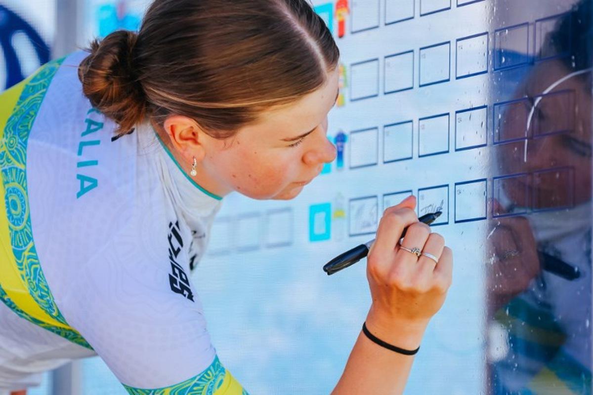 Australia's Talia Appleton of the ARA Australian Cycling Team signs on before the women's elite cycling event of the 2025 Cadel Evans Great Ocean Road Race in Geelong on February 1, 2025.  CHRIS PUTNAM / AFP
