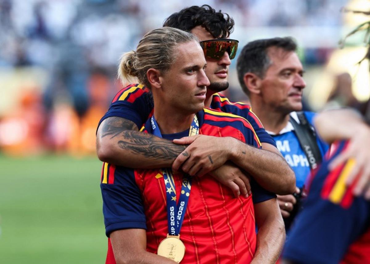 Spain's midfielder #05 Marcos Llorente (in front) and defender #02 Marc Pubill hug after winning the 2026 World Cup football tournament final match between Spain and Argentina at the New York/New Jersey Stadium in East Rutherford on July 19, 2026.   FRANCK FIFE / AFP