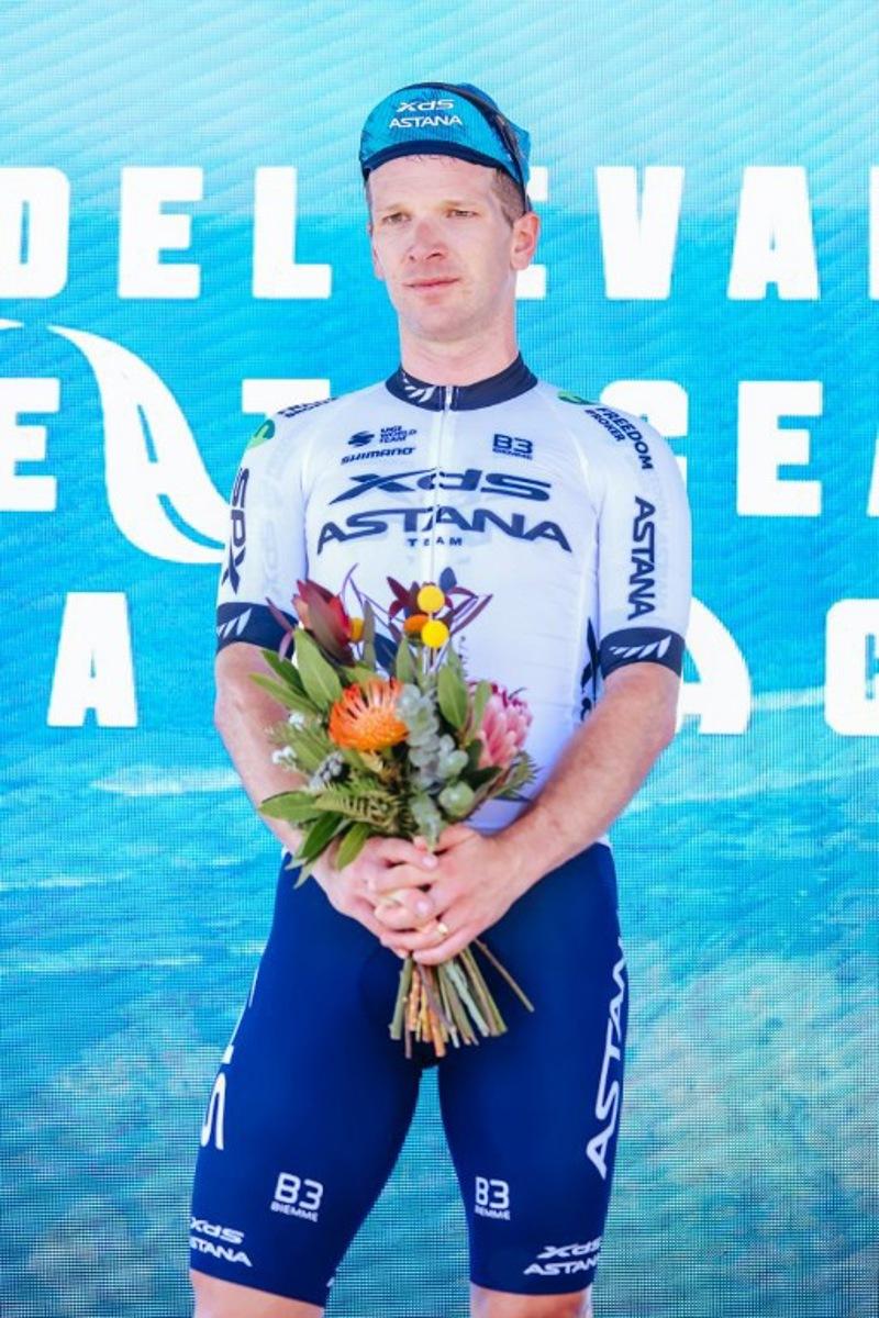 Second-placed New Zealand's Aaron Murray Gate of XDS Astana Team stands on the podium after the men's elite cycling event of the 2025 Cadel Evans Great Ocean Road Race in Geelong on February 2, 2025.  CHRIS PUTNAM / AFP