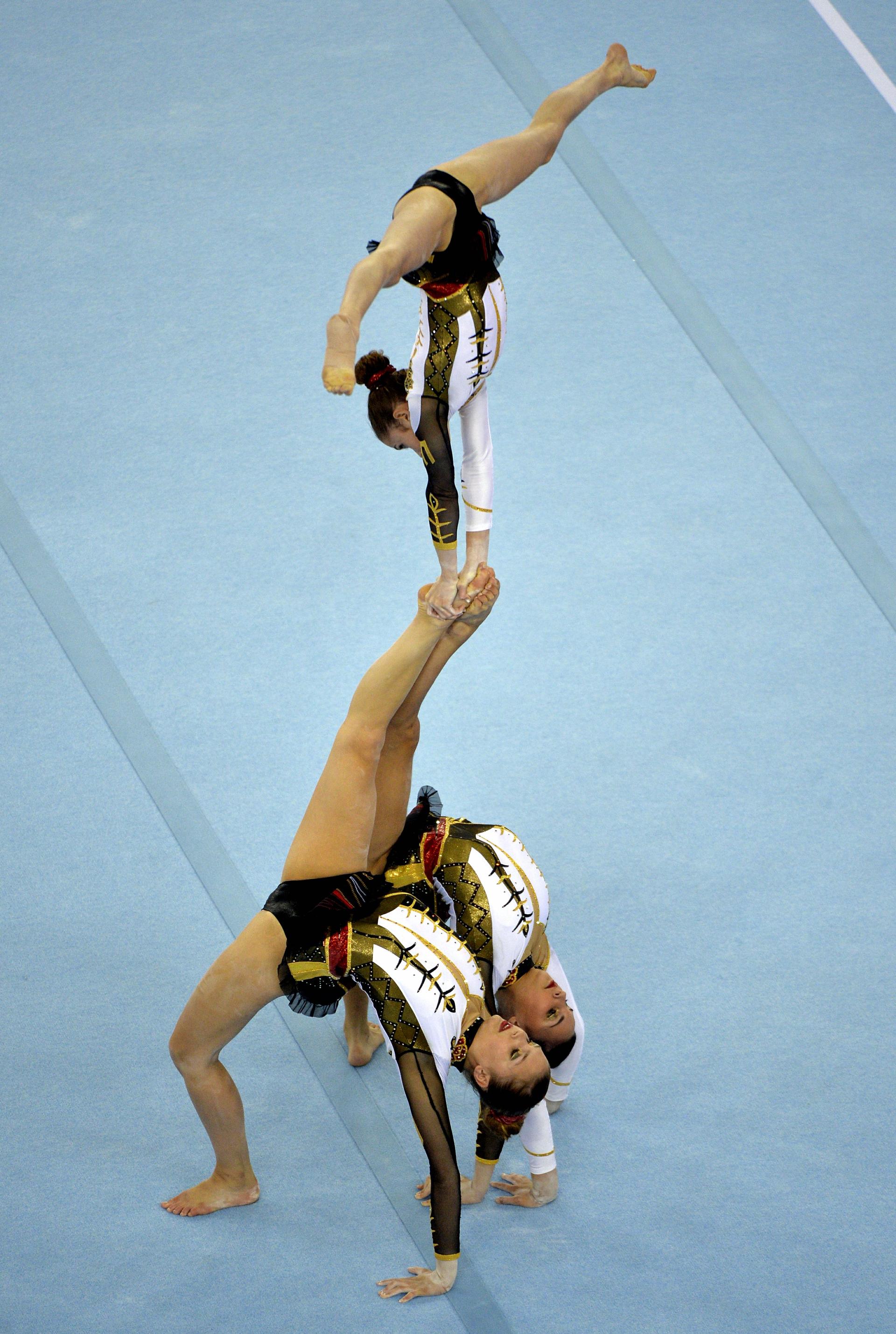 20150619 - BAKU, AZERBAIJAN: Belgian gymnast Julie Van Gelder, Belgian gymnast Ineke Van Schoor and Belgian gymnast Kaat Dumarey pictured in action during the acrogym acrobatic gymnastics final, women's group, All-Around, at the European Games 2015, in Baku, Azerbaijan, Friday 19 June 2015. The European Games 2015 multi-sport event takes place from 12 to 28 June. The Belgan women won the gold medal. BELGA PHOTO ERIC LALMAND