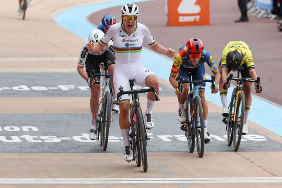 Team SD Worx - Protime's Belgian rider Lotte Kopecky (C) celebrates as she crosses the finish line to win ahead of Lidl - Trek team's Italian rider Elisa Balsamo (2nd R) placing second and Team DSM-Firmenich PostNL's British rider Pfeiffer Georgi (L) placing third, and Team Visma Lease a Bike team's Dutch rider Marianne Vos (R) taking fourth place, during the fourth edition of the women's Paris-Roubaix one-day classic cycling race, 148,5km between Denain and Roubaix, on April 6, 2024.  Francois LO PRESTI / AFP