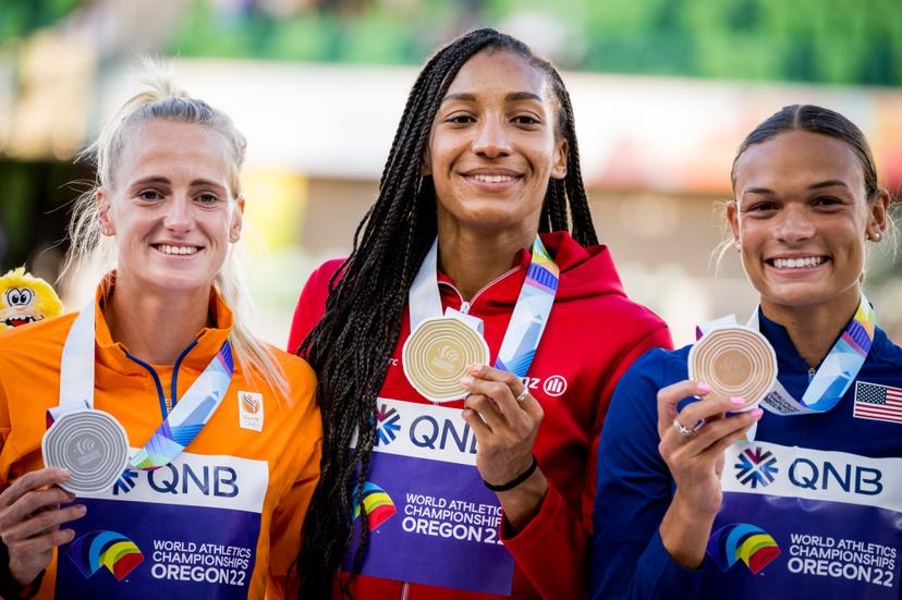 Belgian athlete Nafissatou 'Nafi' Thiam, Anouk Vetter and Anna Hall celebrates on the podium after winning the women's heptathlon competition, at the 19th IAAF World Athletics Championships in Eugene, Oregon, USA, Monday 18 July 2022. The Worlds are taking place from 15 to 24 July, after being postponed in 2021 due to the ongoing corona virus pandemic. BELGA PHOTO JASPER JACOBS