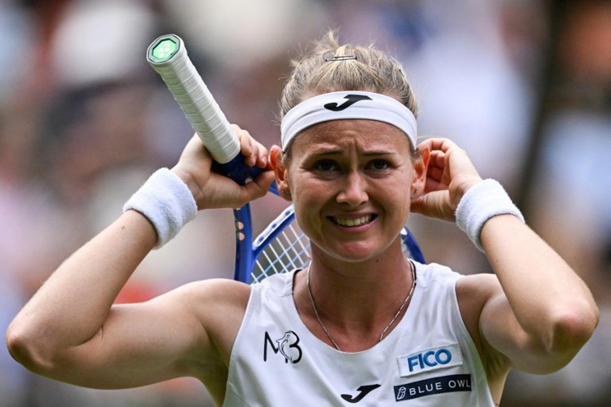 Czech Republic's Marie Bouzkova reacts as she plays against Belarus's Aryna Sabalenka during their women's singles second round tennis match on the third day of the 2025 Wimbledon Championships at The All England Lawn Tennis and Croquet Club in Wimbledon, southwest London, on July 2, 2025.  Kirill KUDRYAVTSEV / AFP
