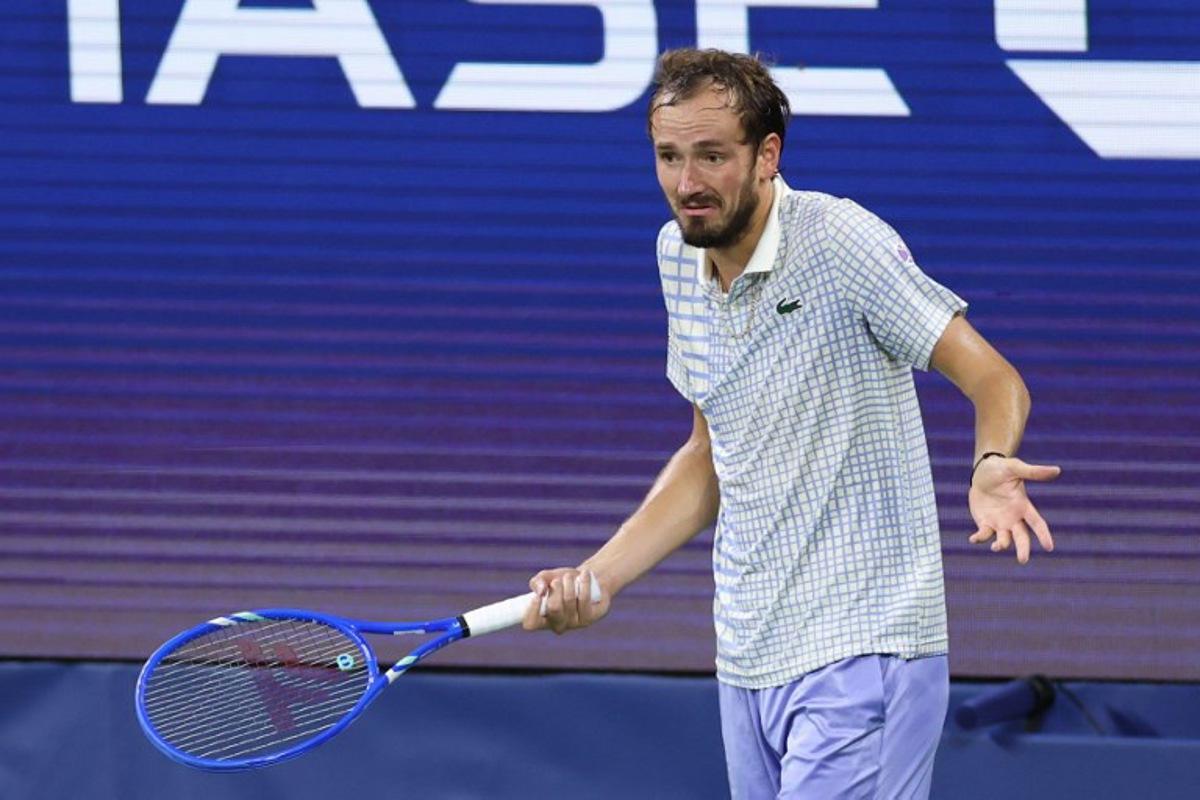 Russia's Daniil Medvedev reacts during his men's singles first round tennis match against France's Benjamin Bonzi on day one of the US Open tennis tournament at the USTA Billie Jean King National Tennis Center in New York City, on August 24, 2025.  CHARLY TRIBALLEAU / AFP