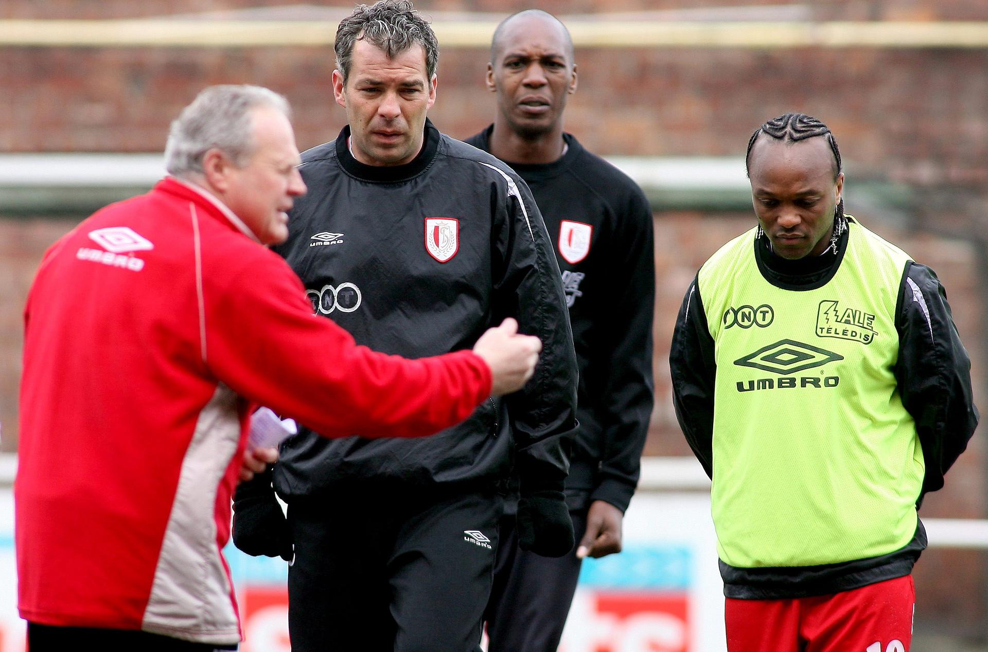 20060410 - LIEGE, BELGIUM : FROM L-R Coach Dominique D'Onofrio ( D ' Onofrio ) talks to Jorge Costa, Christian Negouai and Almani Da Silva Moreira during a training session of Standard soccer team, Monday 10 April 2006, in Liege, ahead of their Cup's half-final return match of Wednesday against Zulte-Waregem. BELGA PHOTO MICHEL KRAKOWSKI